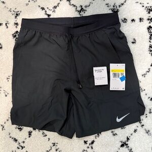 Unworn New Nike running shorts 7”